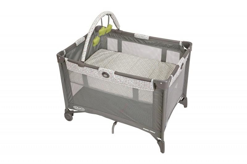 a photo of a graco bassinet playard with automatic folding feet