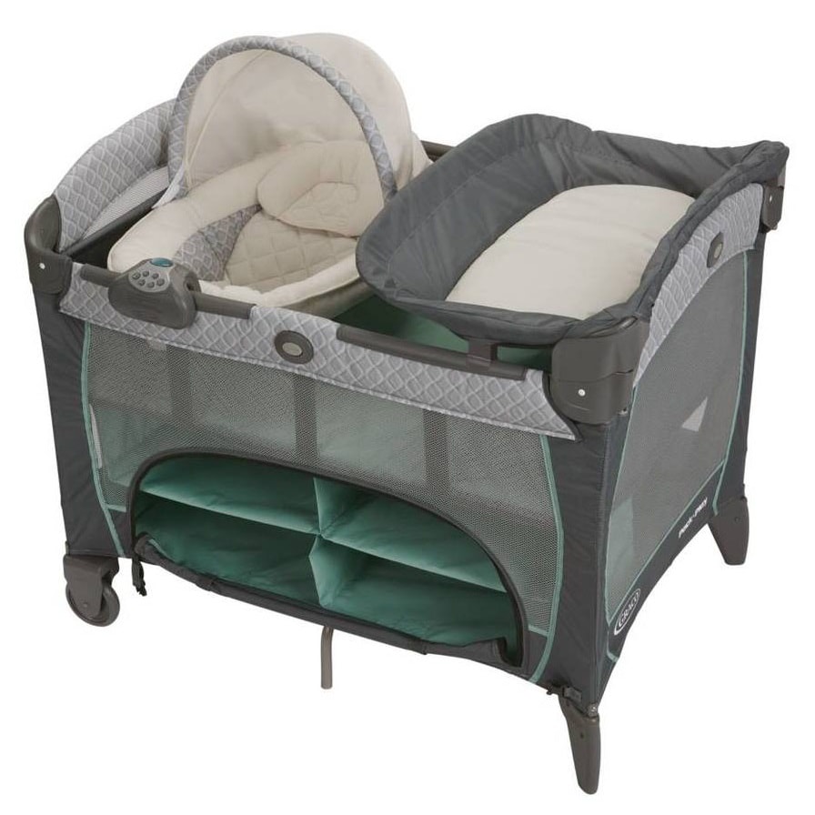a nice playard with a newborn napperstation