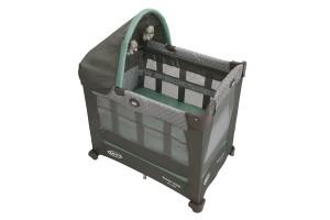 a graco travel lite crib with a bassinet
